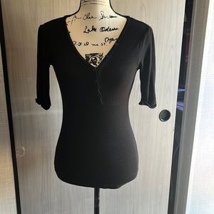 Half sleeve black, half button-down shirt